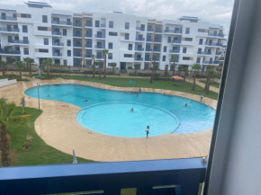 Appartement avec piscine et à pied de la plage, Martil